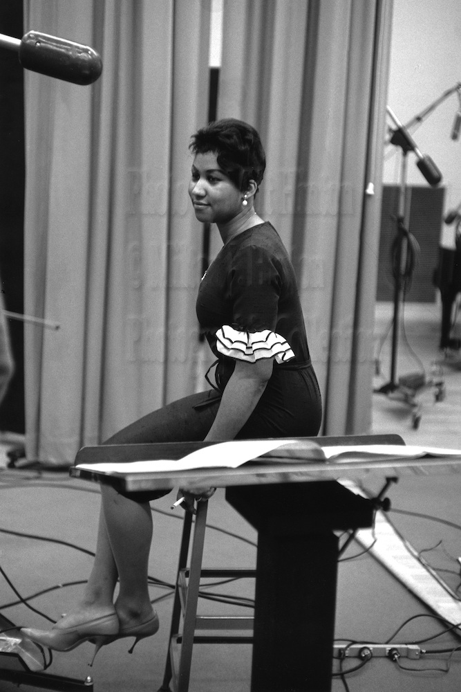 Photo by Milt Hinton<br>
© Milton J. Hinton<br>Photographic Collection <br><b class="captionn">Aretha Franklin, recording studio, New York City, c. 1961</b>