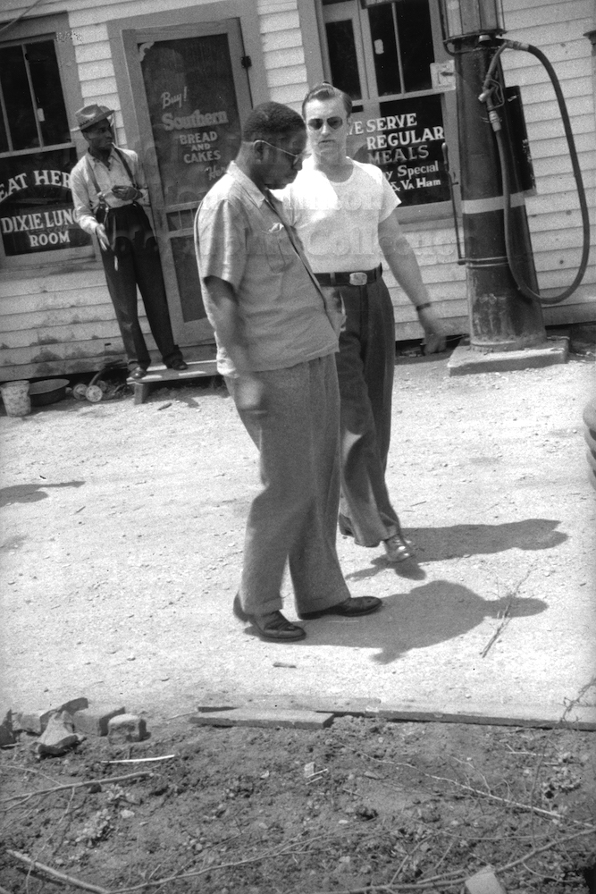 Photo by Milt Hinton<br>
© Milton J. Hinton<br> Photographic Collection <br><b class="captionn"> Cozy Cole (background), Hilton Jefferson, and bus driver, Alabama, c. 1940</b>